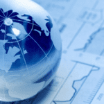 A close up of a globe on top of a table