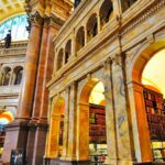A large library with many columns and pillars.
