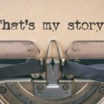 A typewriter with the words " that 's my story ".